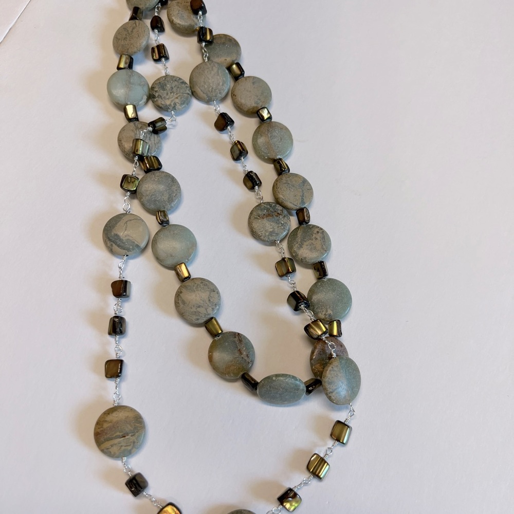Hand crafted stone necklace.